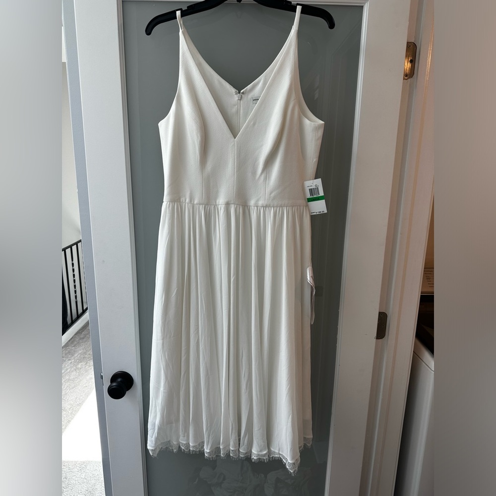 Dress the Population white midi dress with lace trim.
